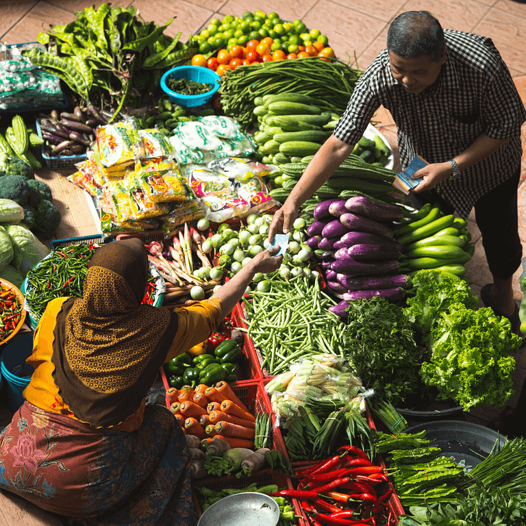 money exchanged for goods at a local street market
